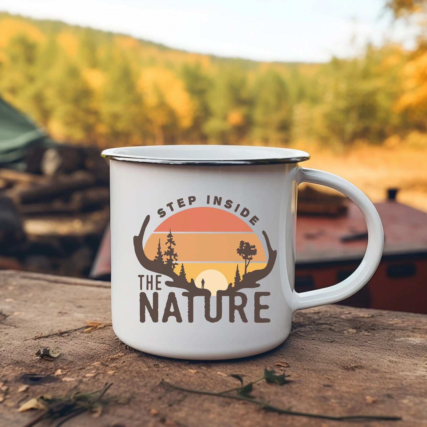 a camper mug sitting on top of a wooden table