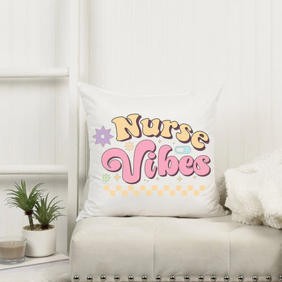 a white couch with a pillow that says nurse vibes