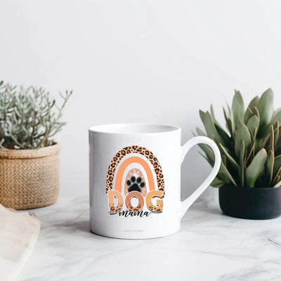 a white coffee mug with a dog on it