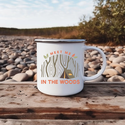 a white coffee mug sitting on top of a wooden table