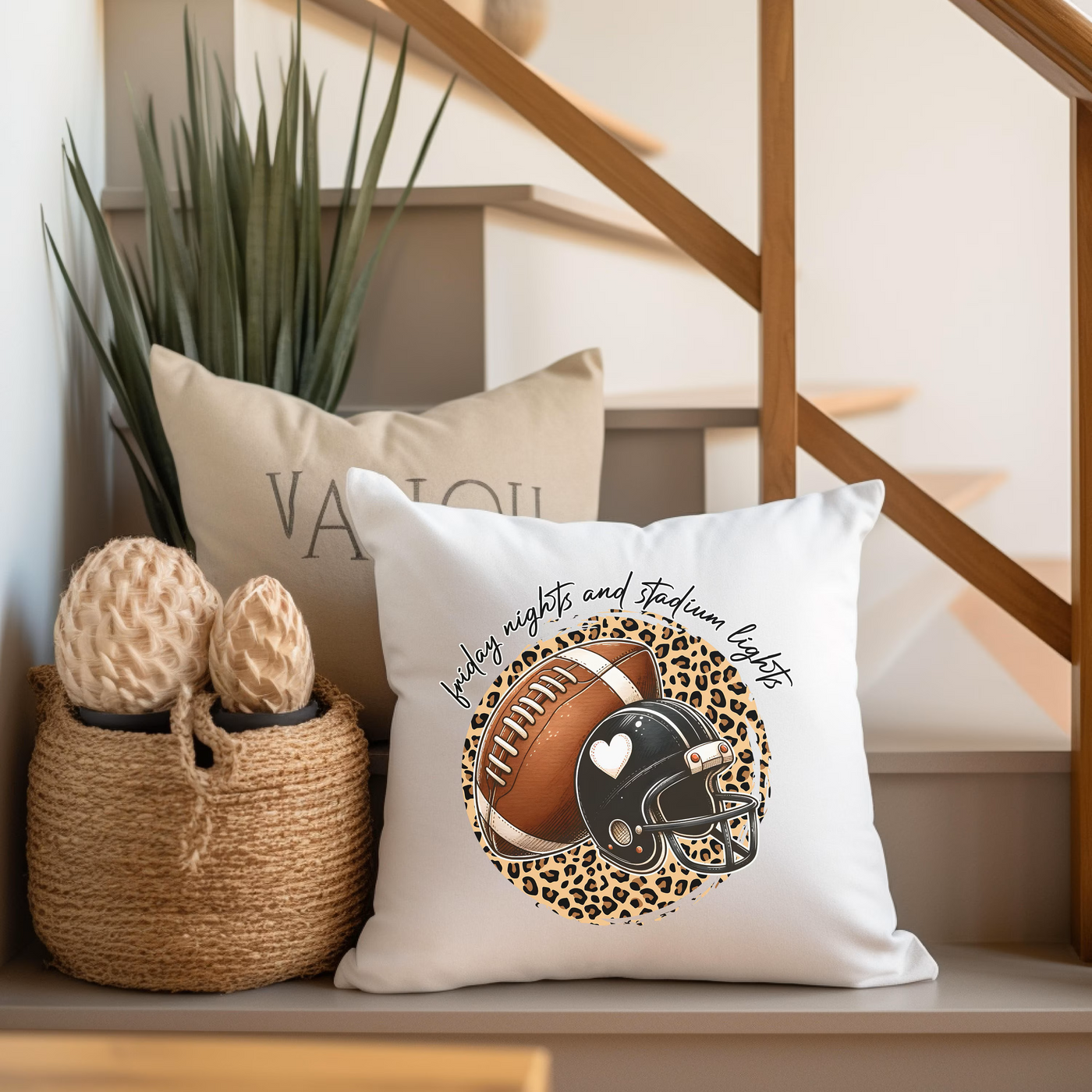 a pillow with a football and leopard print on it