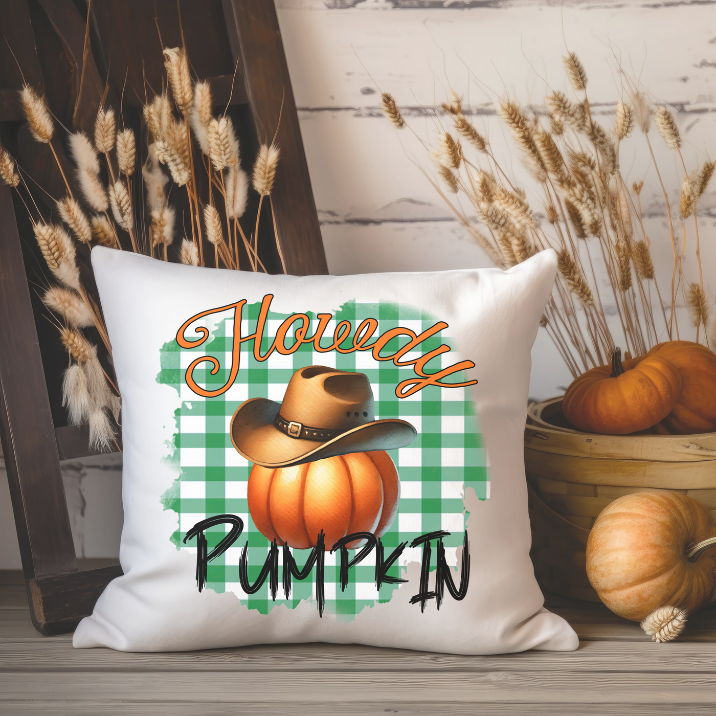 a white pillow with a happy pumpkin on it