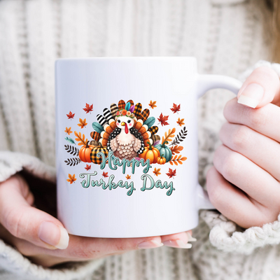 a woman holding a coffee mug with a turkey on it