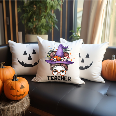 a group of three pillows sitting on top of a couch