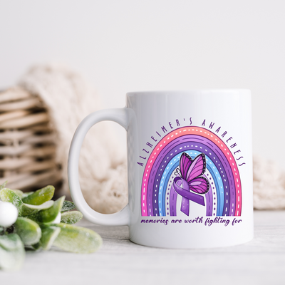 a white coffee mug with a purple butterfly on it