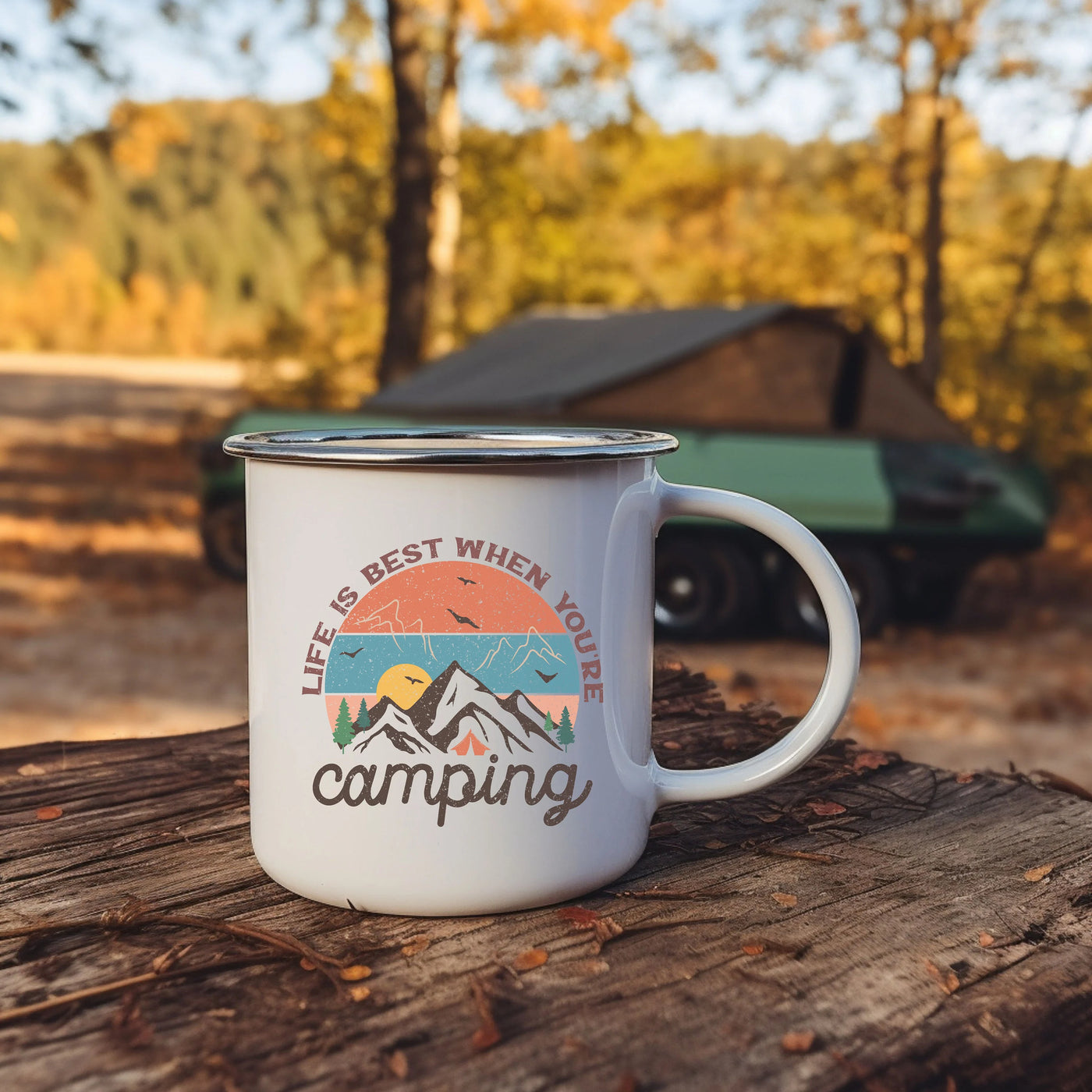 a white coffee mug sitting on top of a tree stump