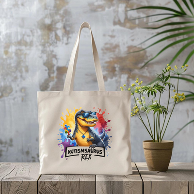 a tote bag with an image of a dinosaur on it