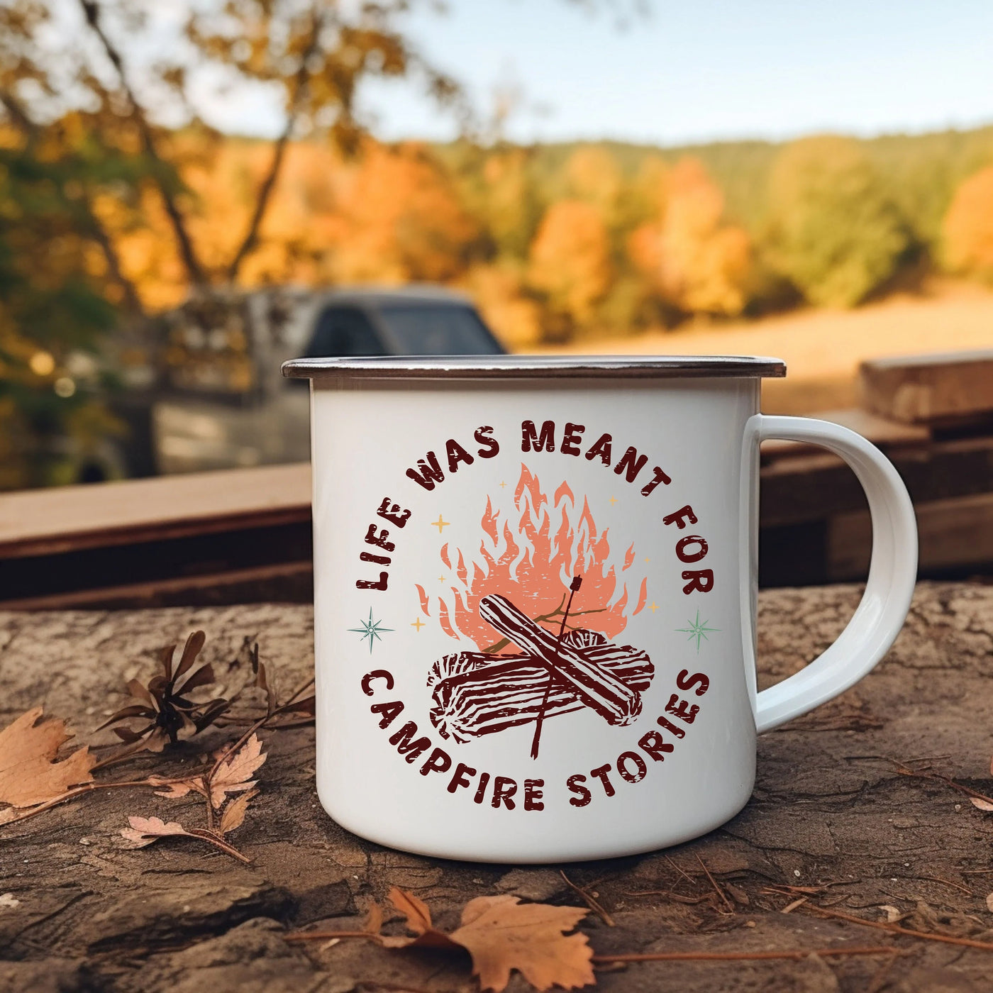 a campfire mug sitting on the ground