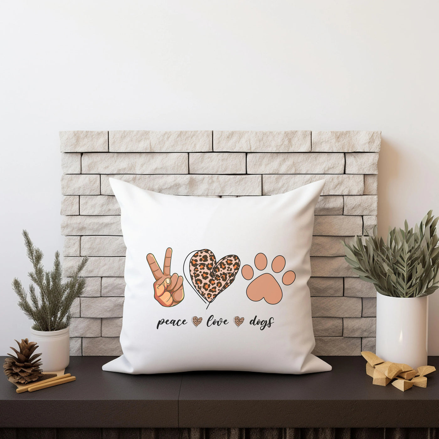 a pillow with a peace love and paw prints on it