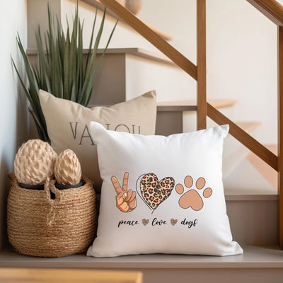 a white pillow with a paw heart and paw prints on it