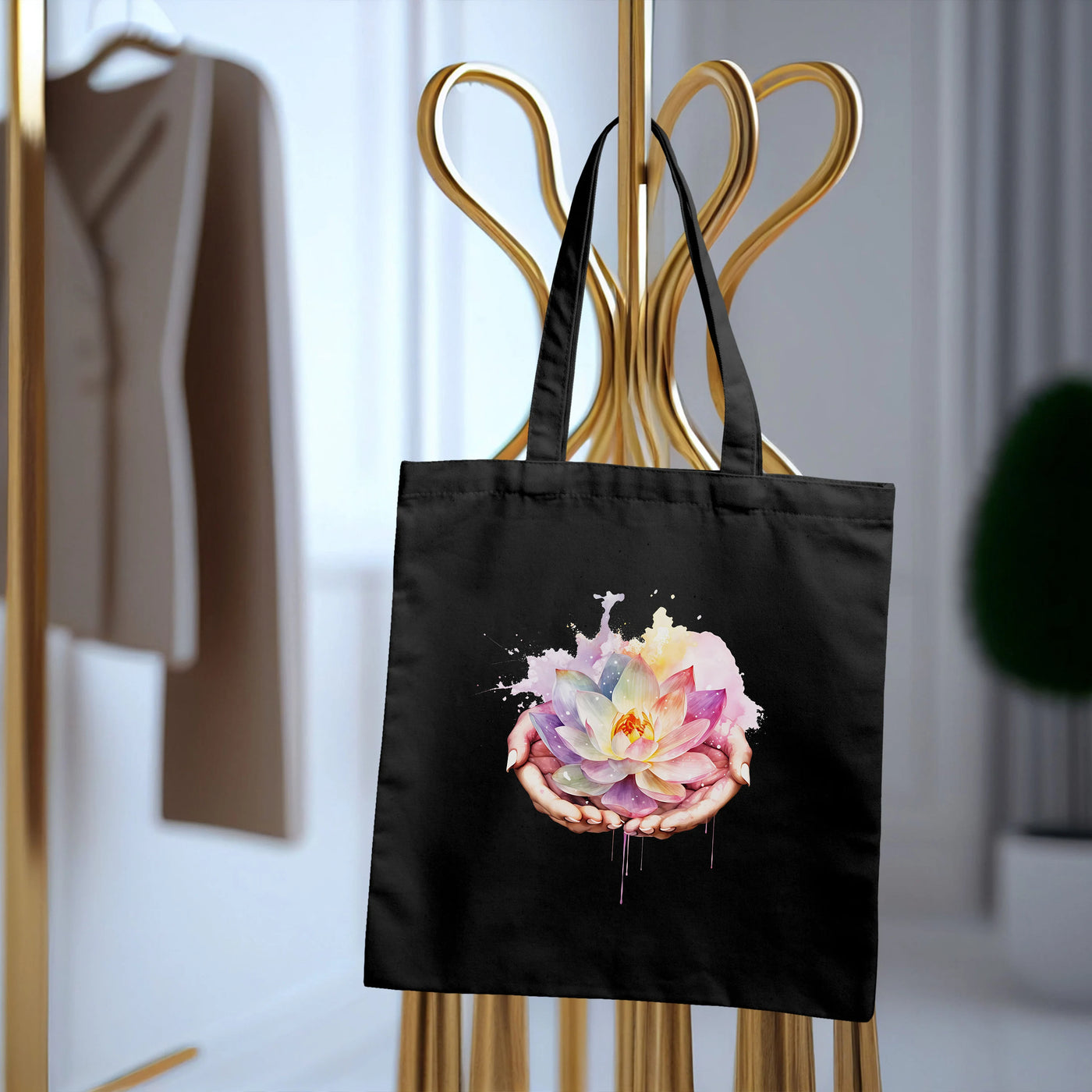 a black shopping bag with a picture of a flower on it