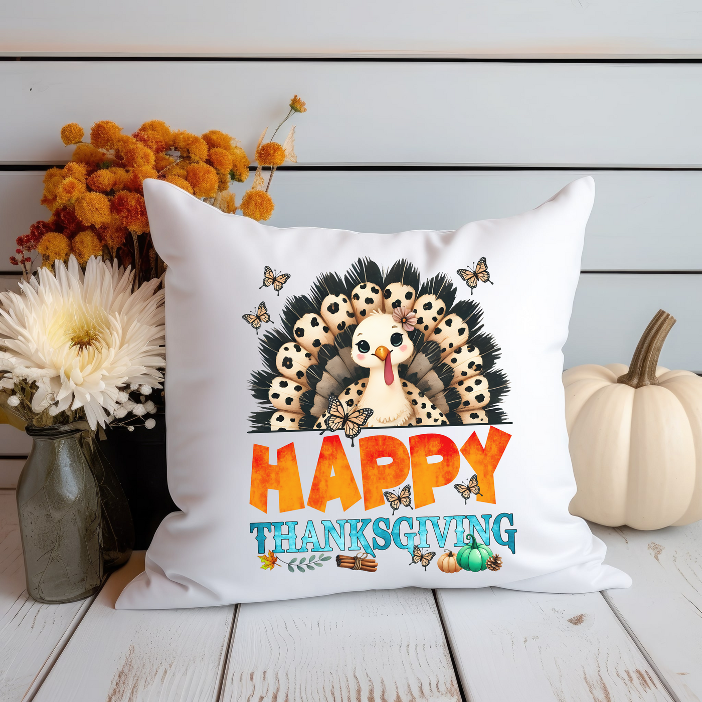 a white pillow with a happy thanksgiving turkey on it