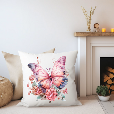 a white pillow with a pink butterfly on it