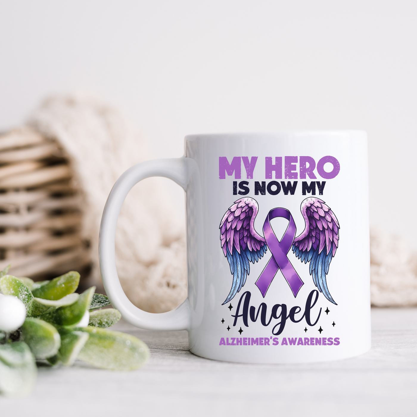 a coffee mug with an angel design on it