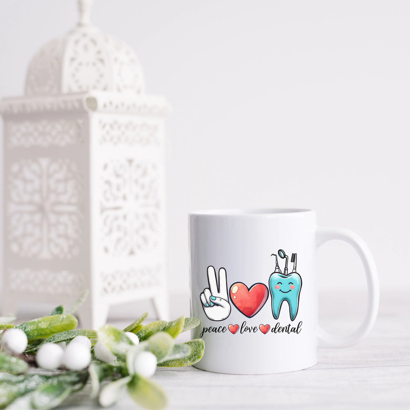 a white coffee mug with two hearts and a peace sign