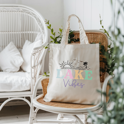 a tote bag sitting on a chair next to a potted plant