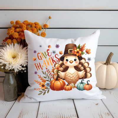 a white pillow with a thanksgiving turkey on it