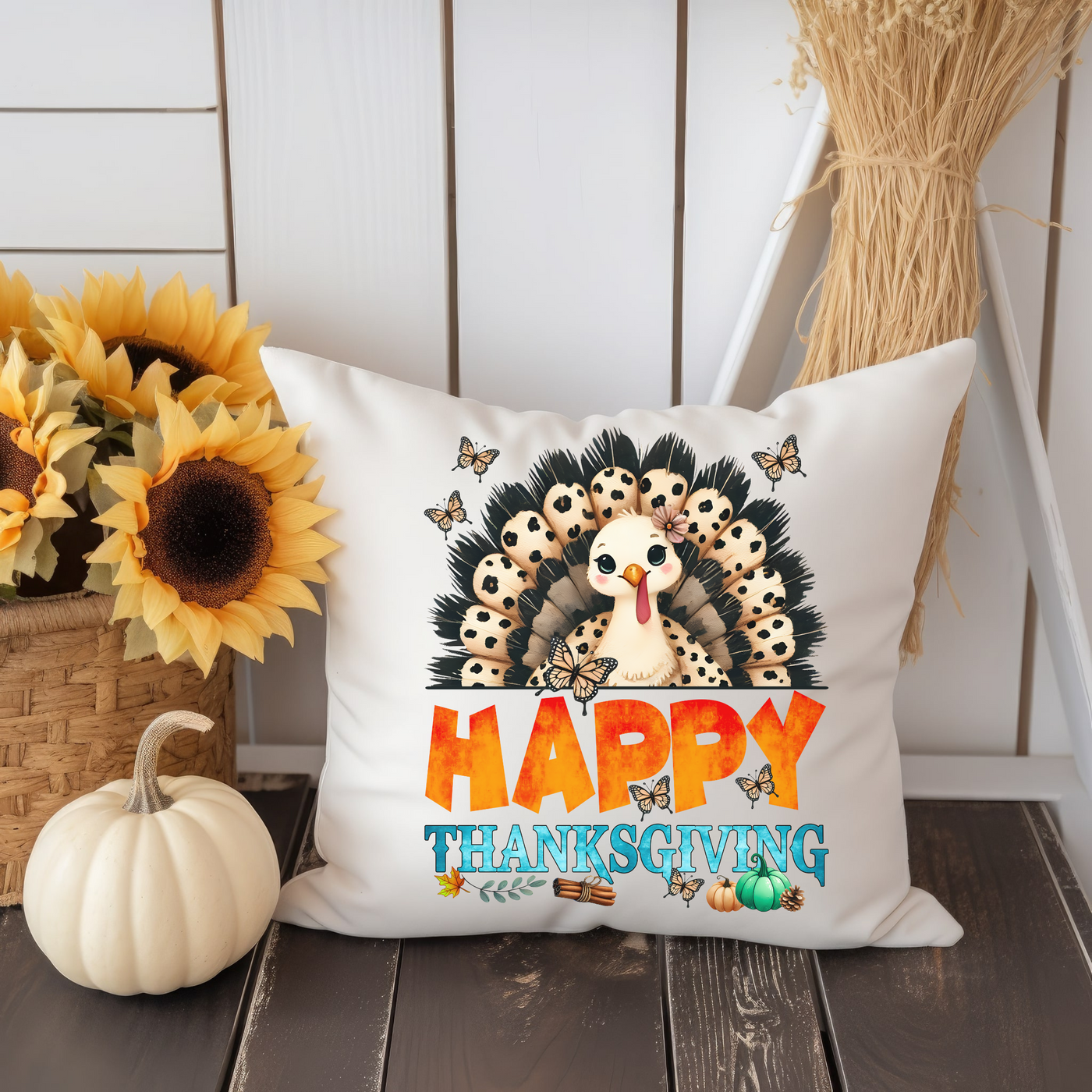 a white pillow with a happy thanksgiving turkey on it