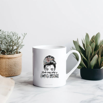 a white coffee mug with a picture of a woman's face on it