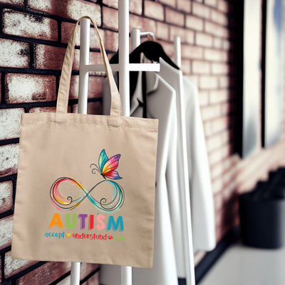 a tote bag hanging on a brick wall