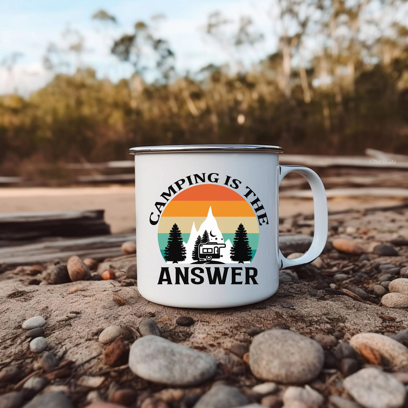 a camping is the answer coffee mug sitting on the ground