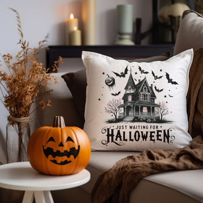 a halloween pillow sitting on top of a couch