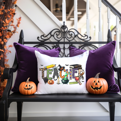 a bench with two pumpkins and a pillow on it