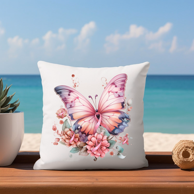 a white pillow with a pink butterfly on it