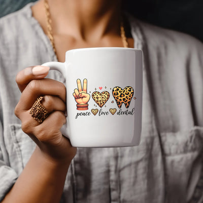 a woman holding a coffee mug with peace love rental written on it