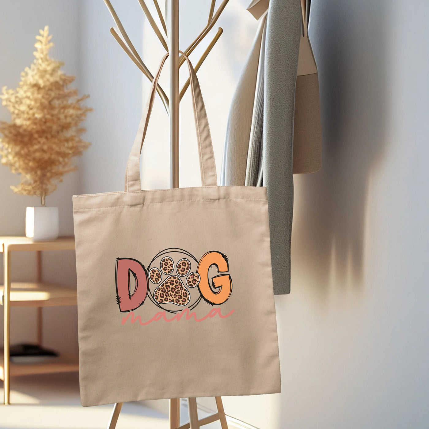 a tote bag hanging on a coat rack