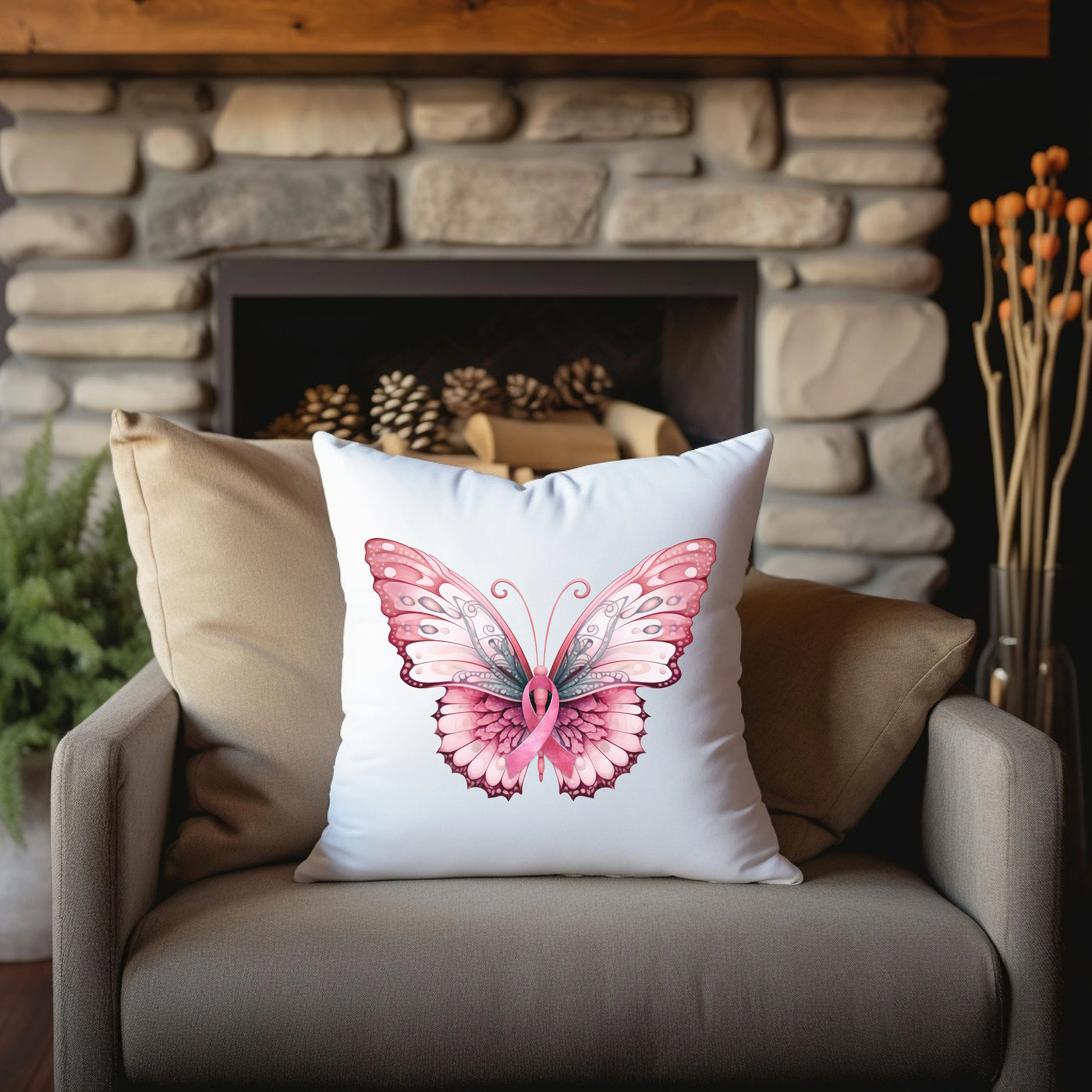 a pink butterfly pillow sitting on a chair in front of a fireplace