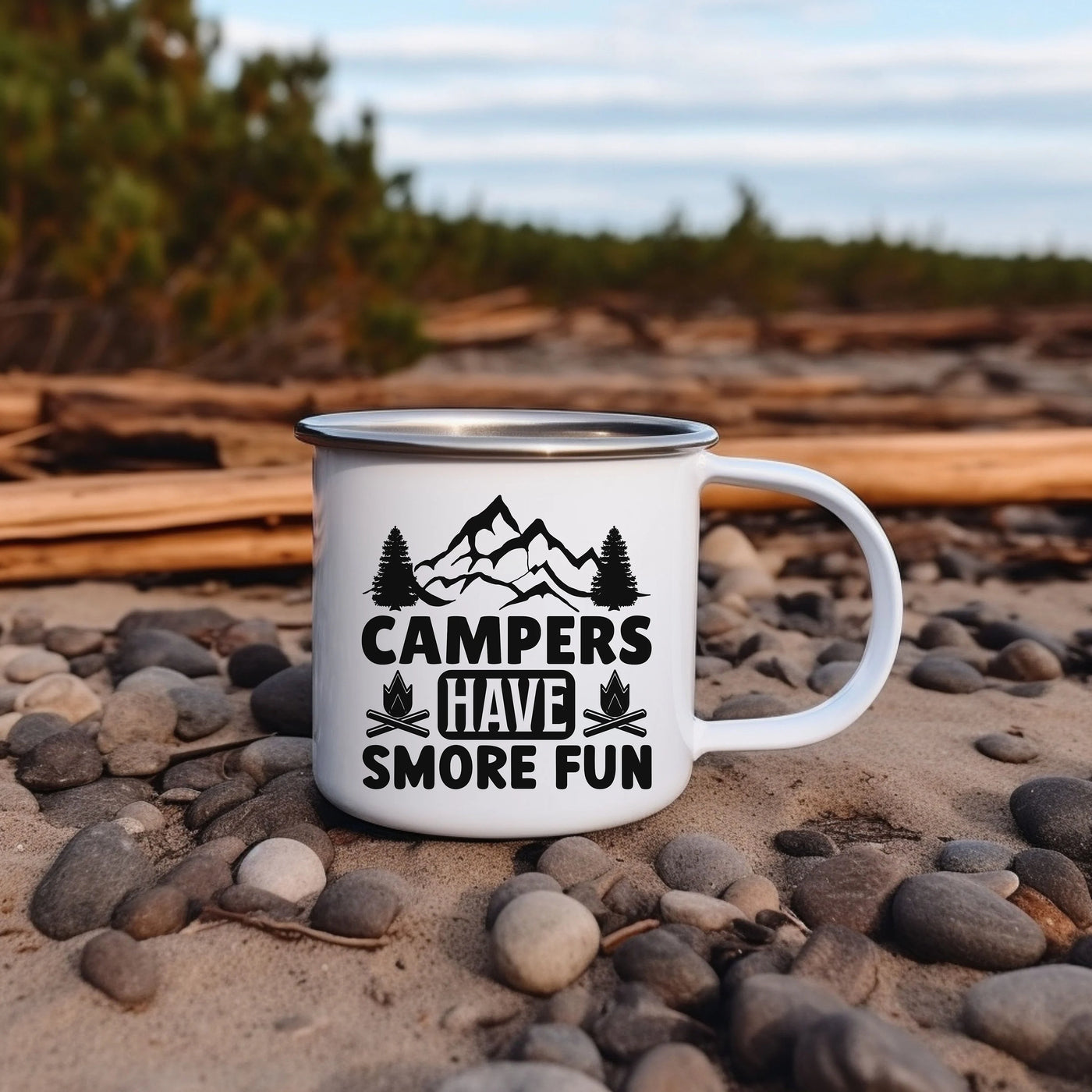 a camper's mug sitting on a rocky beach