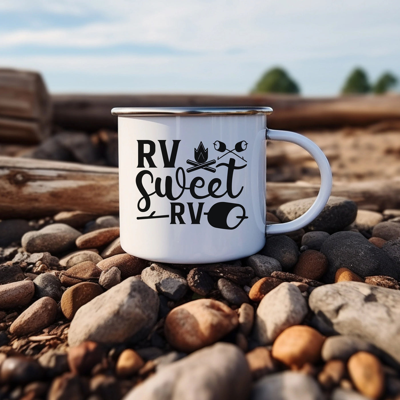 a white coffee mug sitting on top of a pile of rocks