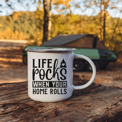 a white coffee mug sitting on top of a wooden table