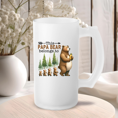 a white coffee mug with a picture of a bear