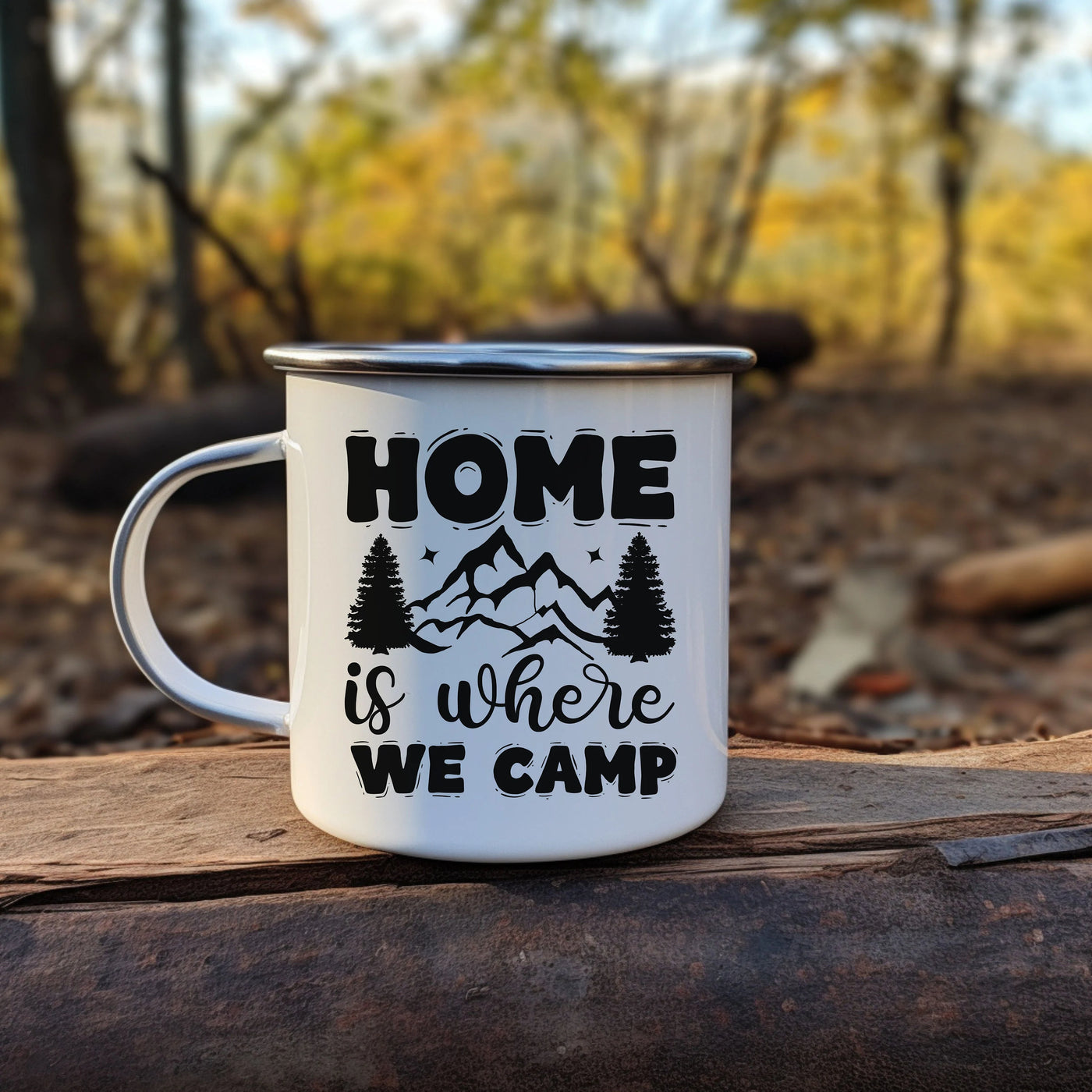 a camp mug sitting on top of a log