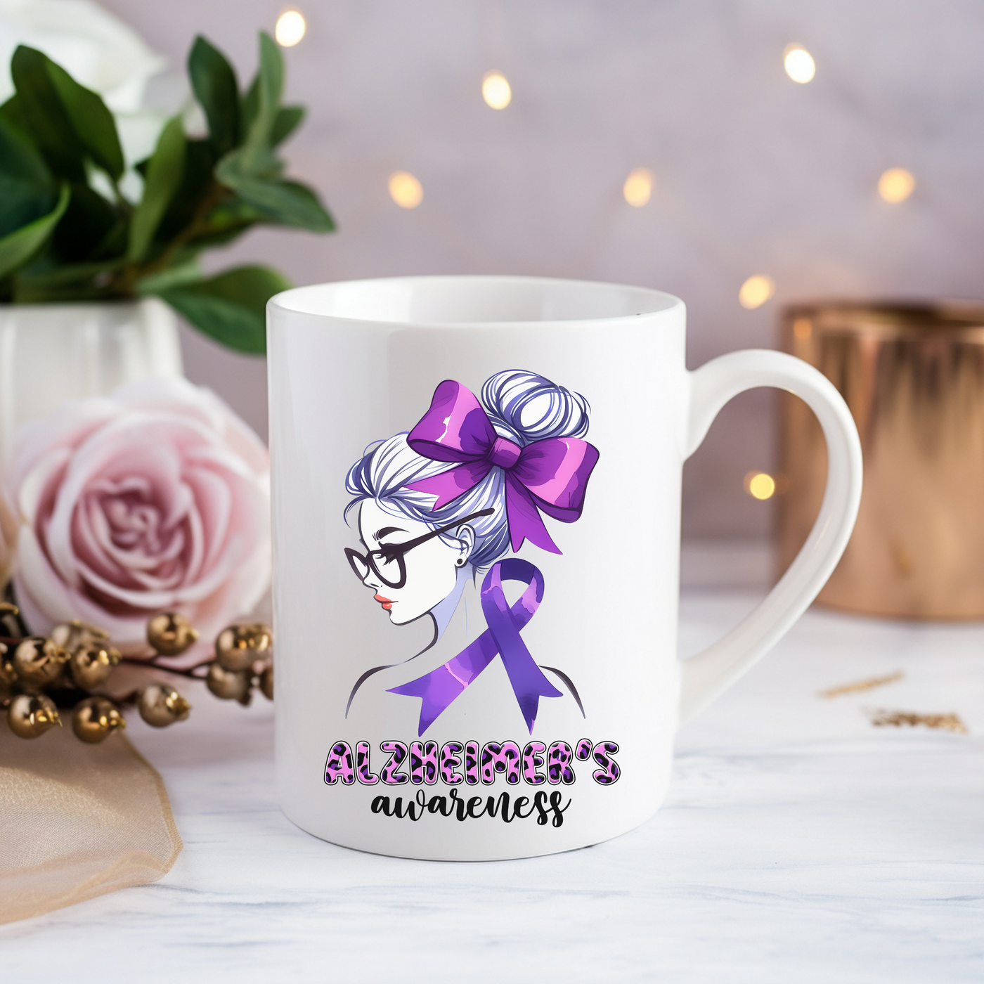 a white coffee mug with a purple ribbon on it