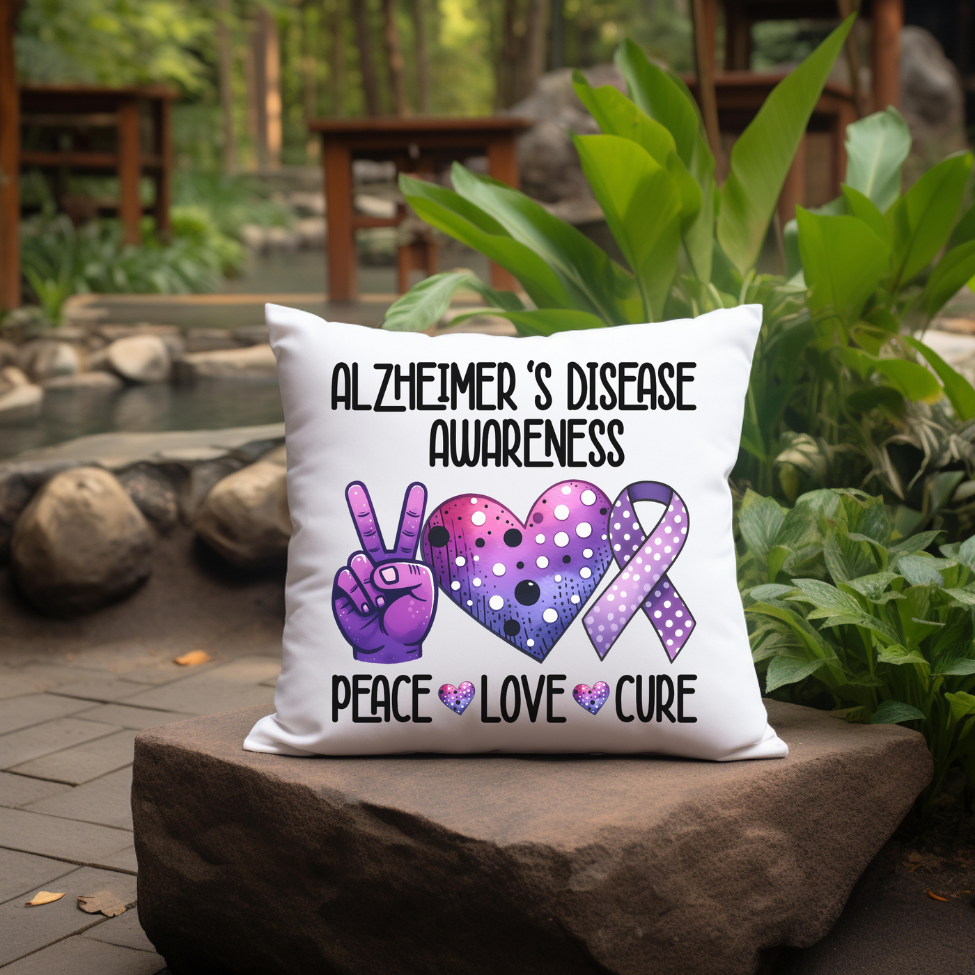 a pillow that says, al zhemer's disease awareness peace love care