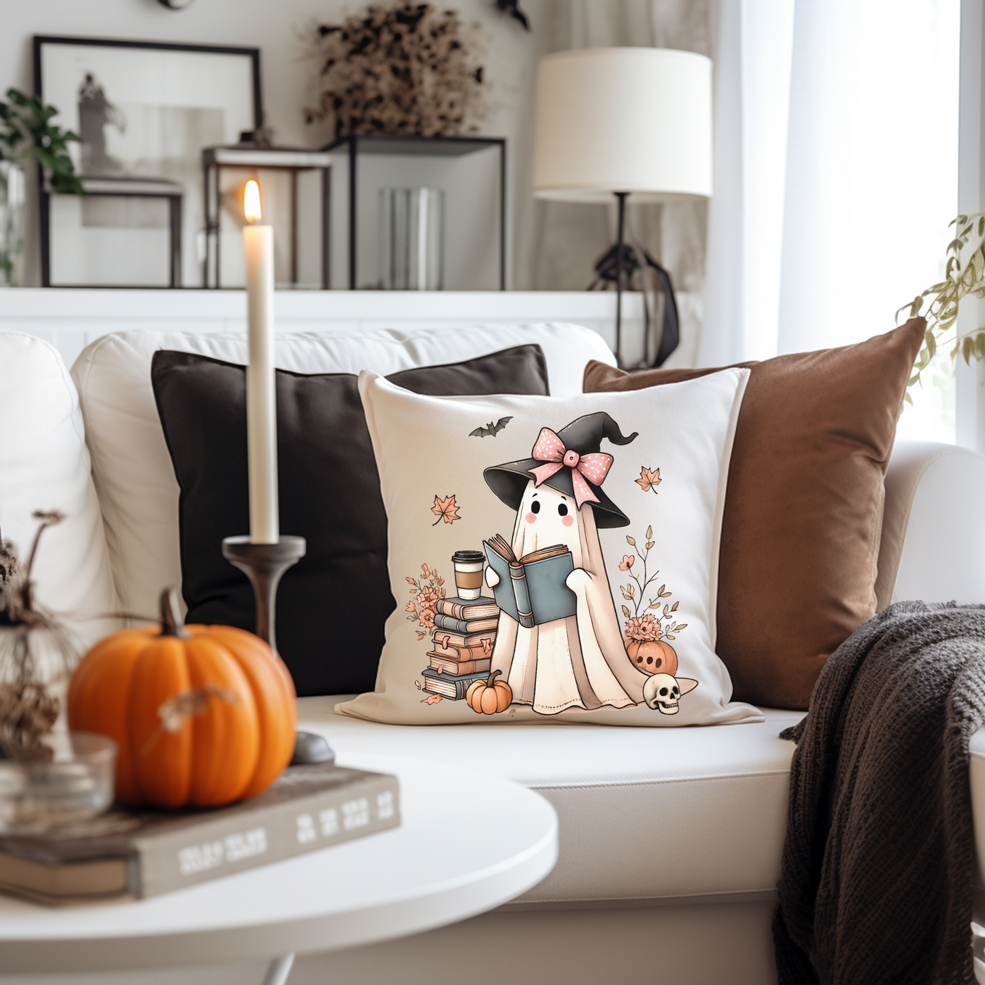 a living room with a white couch and pillows