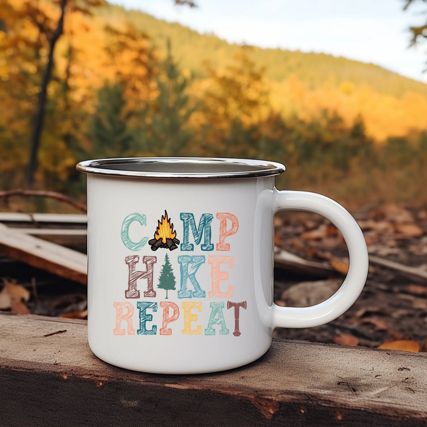 a camp mug sitting on top of a wooden table