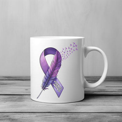 a coffee mug with a purple ribbon and a feather