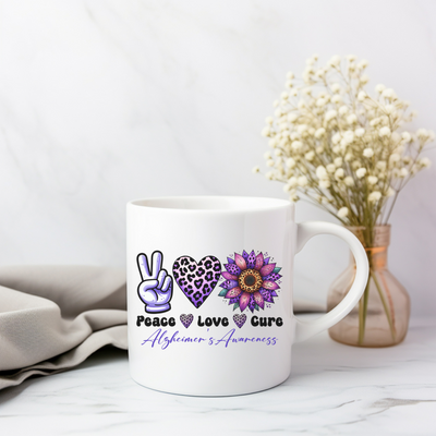 a white coffee mug with a peace love guru on it