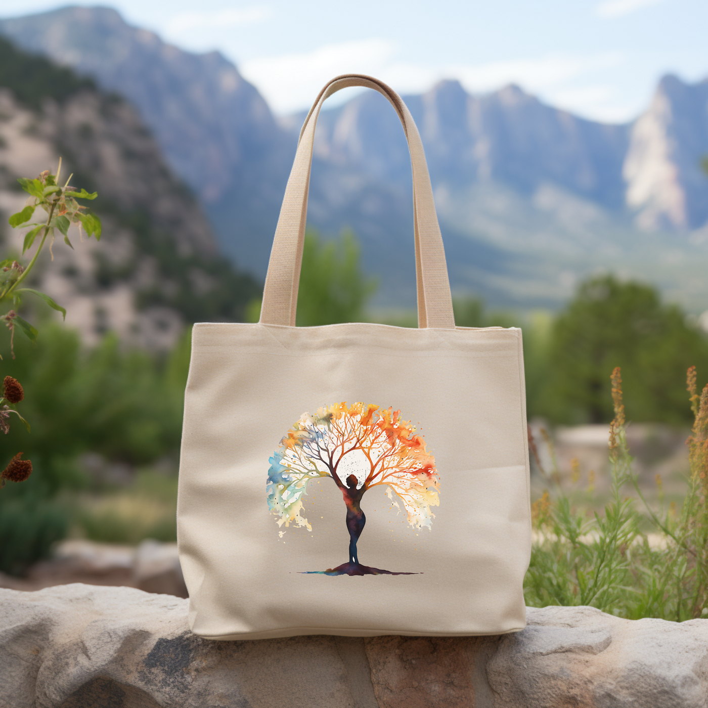 a tote bag with a tree painted on it