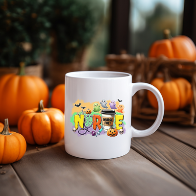 a white coffee mug sitting on top of a wooden table