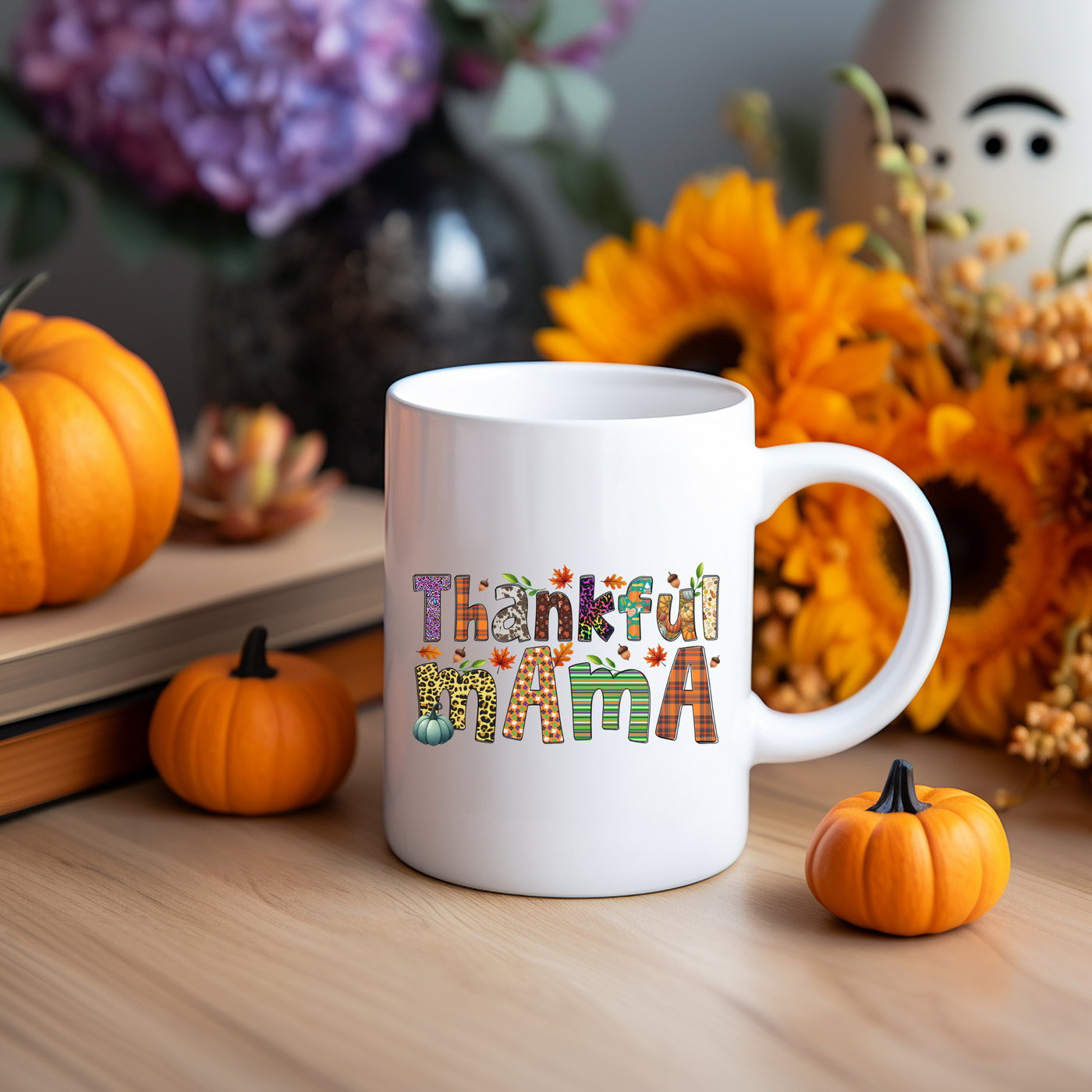 a white coffee mug sitting on top of a wooden table