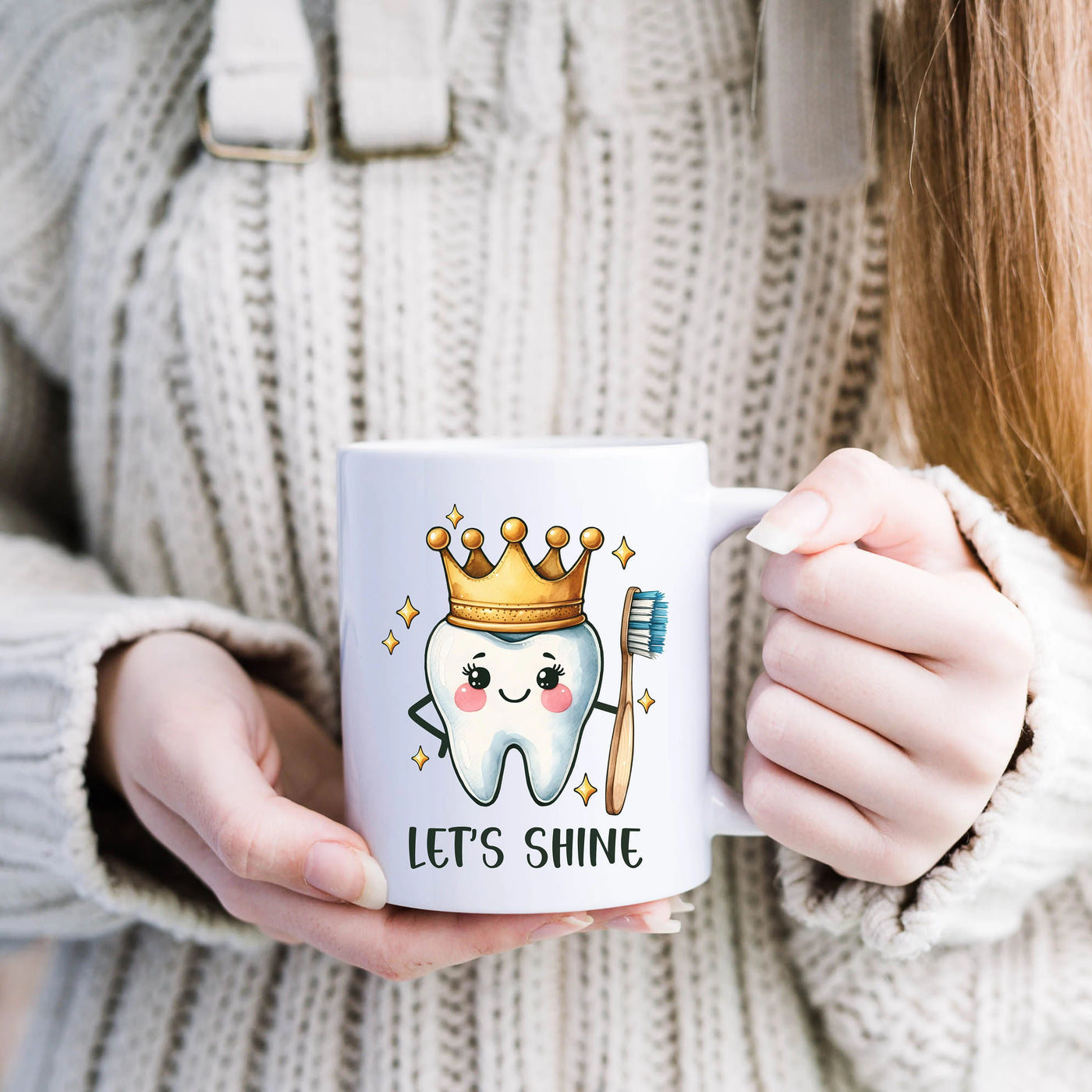 a woman holding a coffee mug with a toothbrush