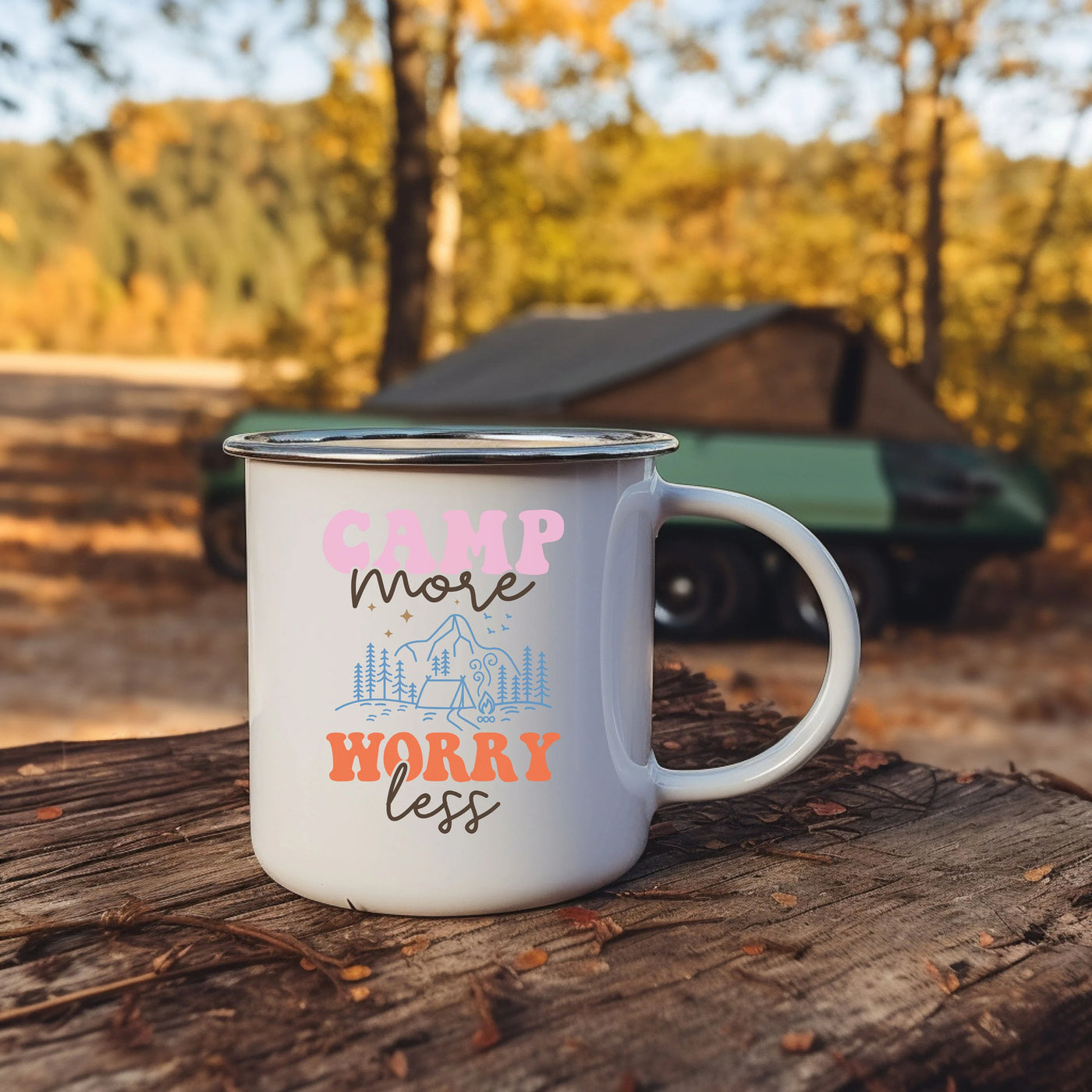 a camp mug sitting on top of a tree stump