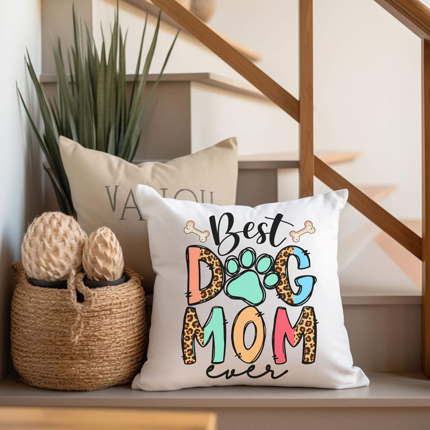 a dog mom pillow sitting on top of a shelf