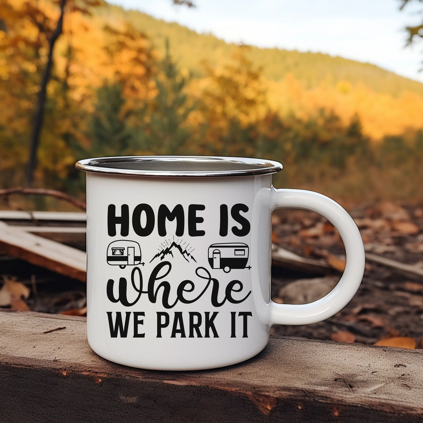 a camper mug sitting on top of a wooden table