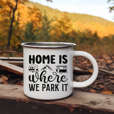 a camper mug sitting on top of a wooden table